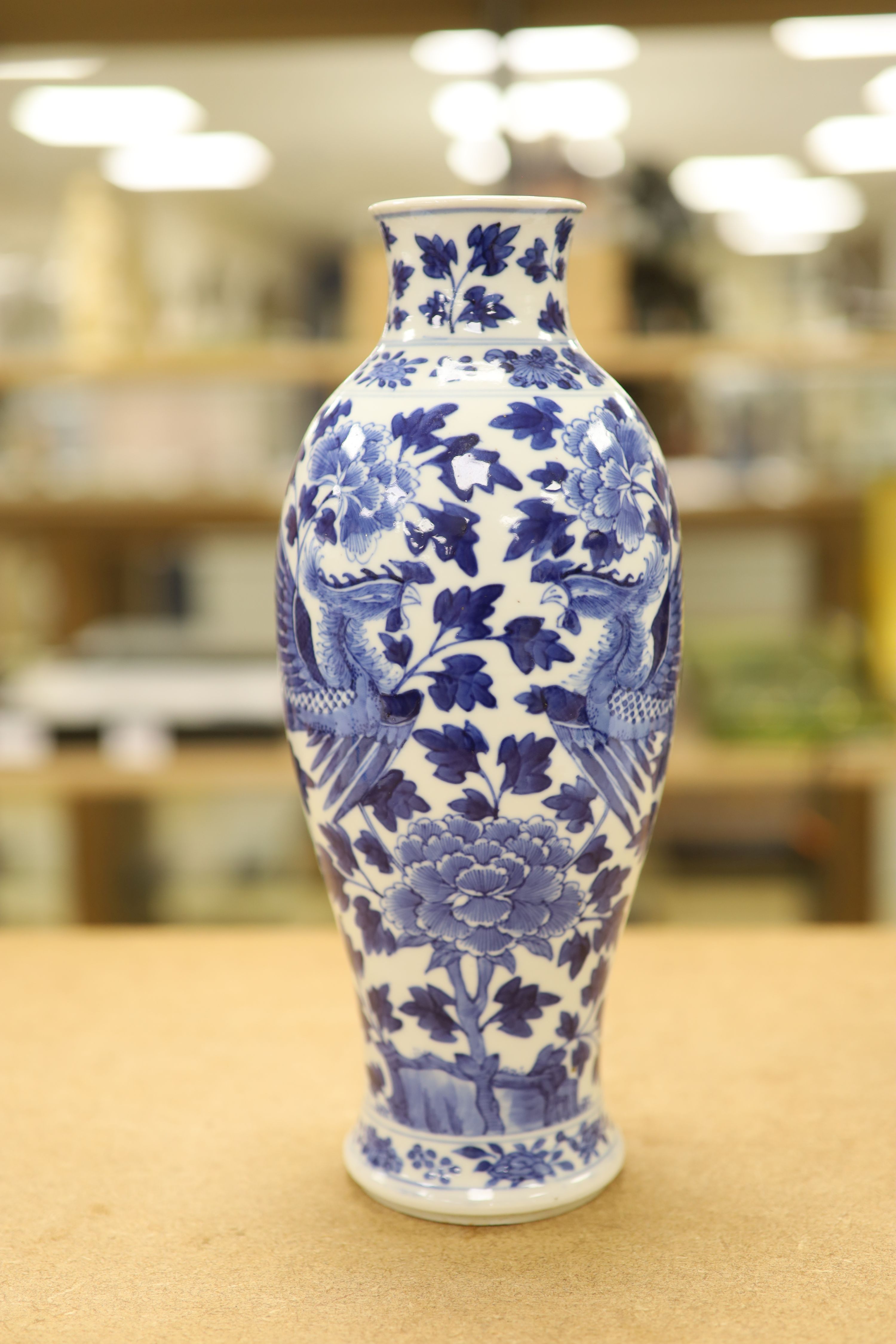 Two 19th century Chinese blue and white vases, decorated with phoenix, tallest 28cm (a.f)